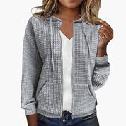 Zacht dames vest met rits en capuchon in wafelstructuur