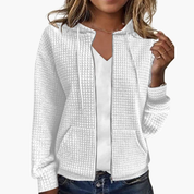 Zacht dames vest met rits en capuchon in wafelstructuur