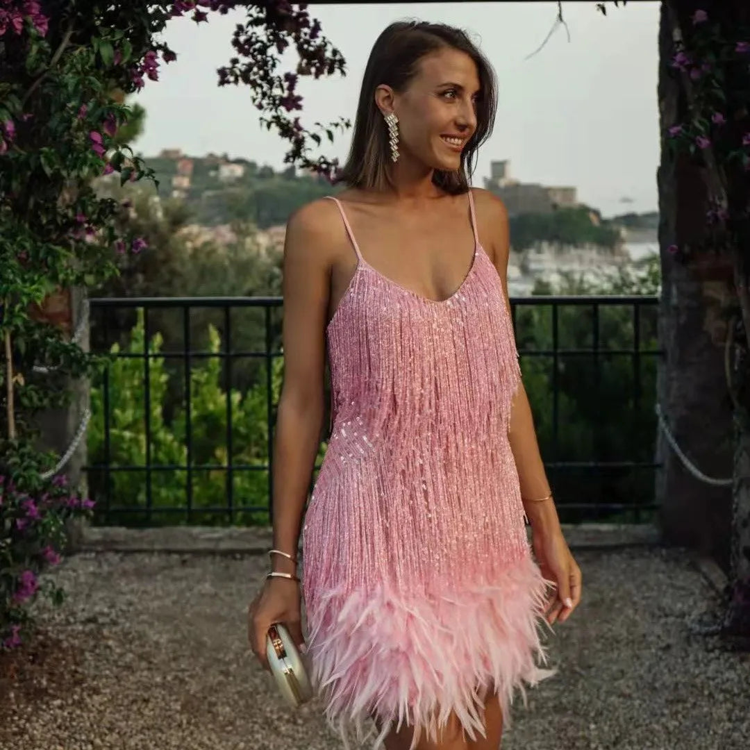 Cocktailjurk met pailletten en veren - Isolde