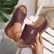 Comfortabele instap slippers met sleehak - Noëlle