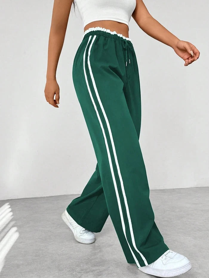 Dames Sportbroek met Zijstrepen – Wijde Pijpen en Elastische Taille