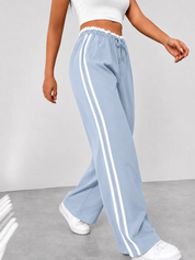Dames Sportbroek met Zijstrepen – Wijde Pijpen en Elastische Taille