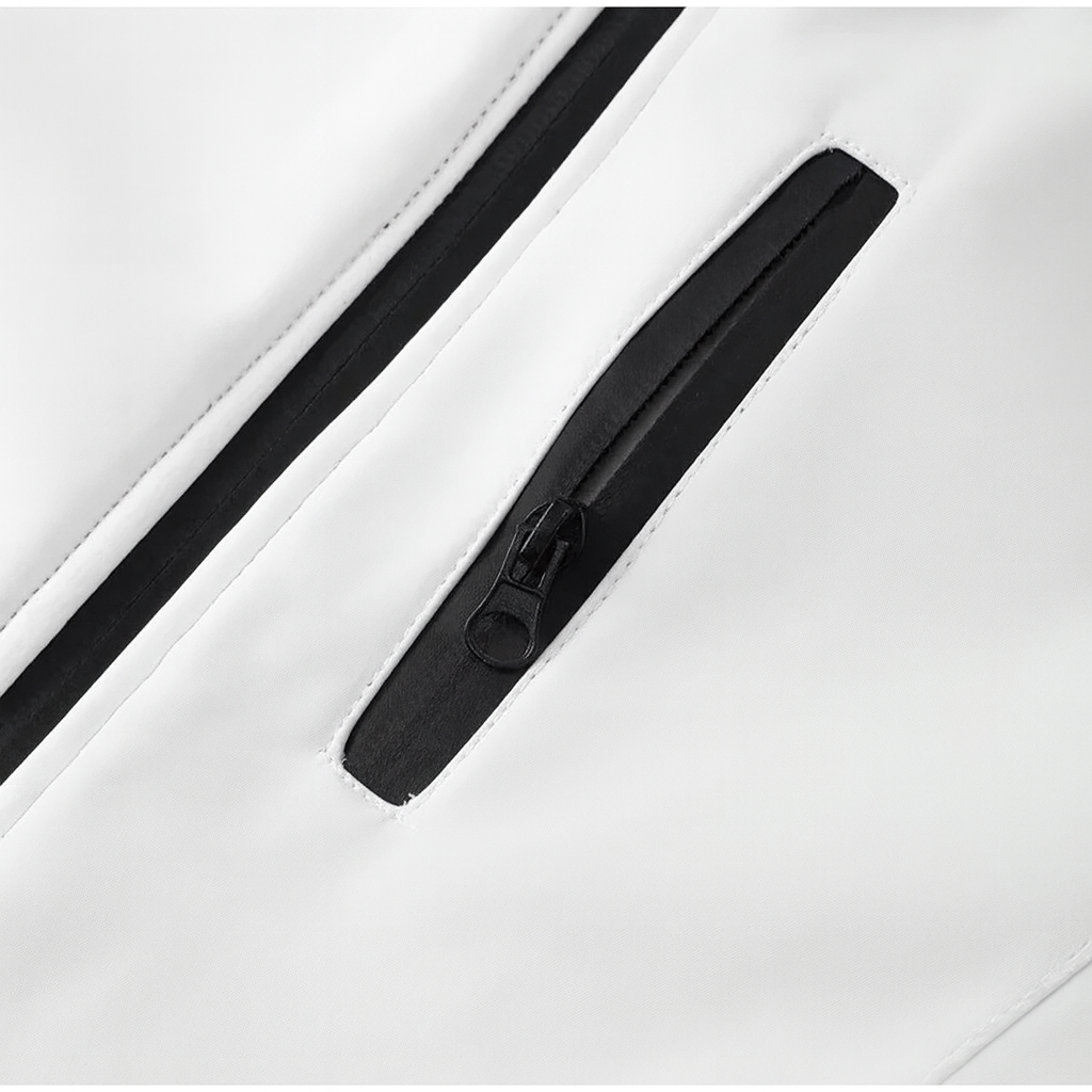 Elegant aansluitend dames skipak met riem en contrasterende details