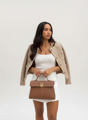 Elegant damesvest met knoopsluiting en zakken – Nilda