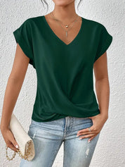 Elegante V-hals top met gedrapeerd detail - Mila
