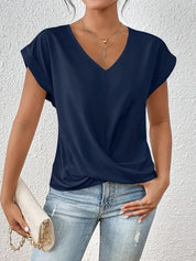 Elegante V-hals top met gedrapeerd detail - Mila