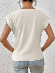 Elegante V-hals top met gedrapeerd detail - Mila