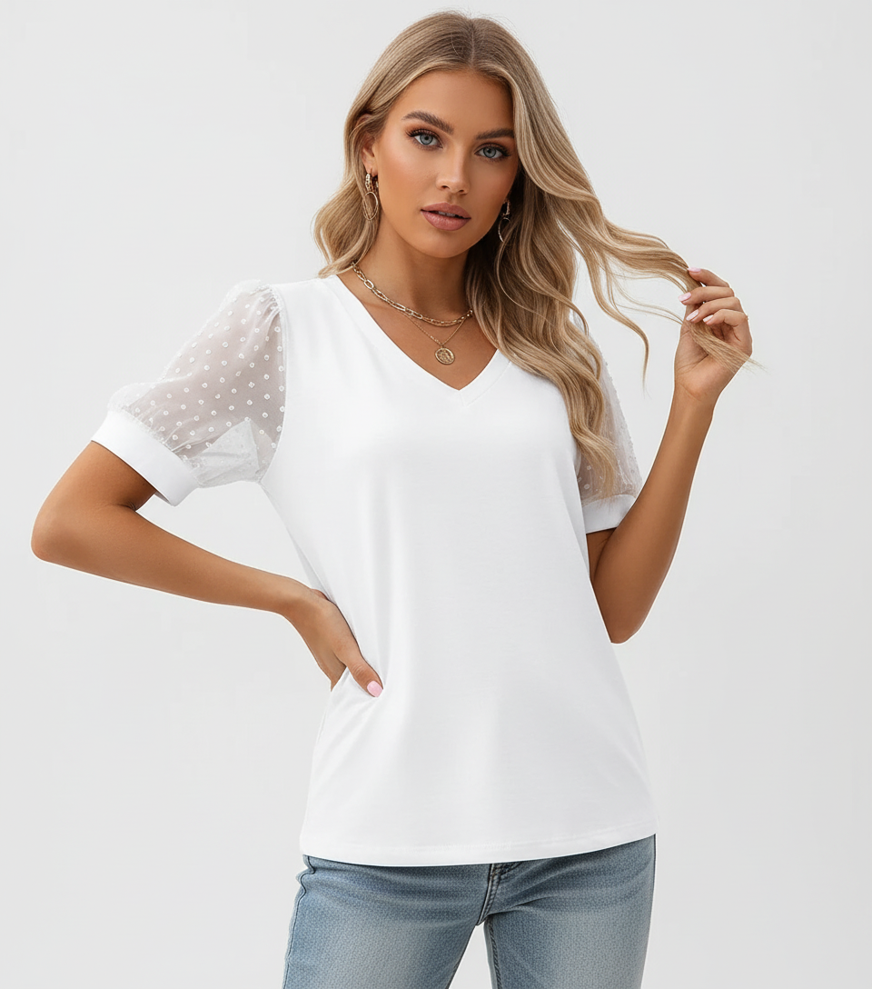 Elegante dames top met transparante stipmouwen – Elin
