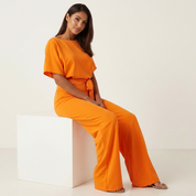 Elegante jumpsuit met tailleceintuur en vloeiende pasvorm