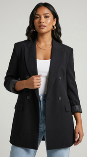 Elegante lange damesblazer met dubbele knoopsluiting