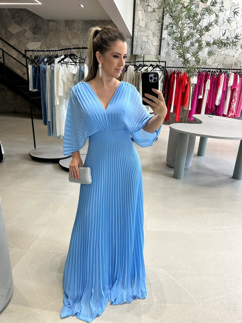 Elegante maxi jurk met plissérok en wijde mouwen