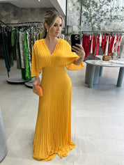 Elegante maxi jurk met plissérok en wijde mouwen