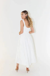 Elegante midi damesjurk met vierkante halslijn