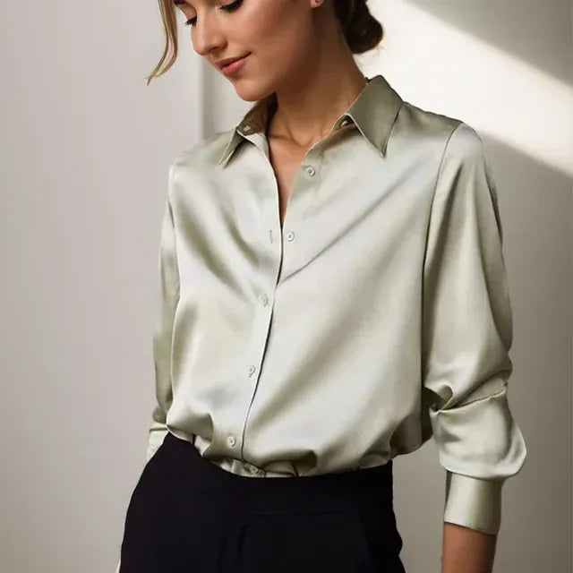 Elegant, fluid women's blouse with a subtle sheen