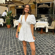 Elegante witte broderie jurk met pofmouwen – Lydia