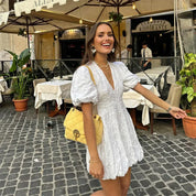 Elegante witte broderie jurk met pofmouwen – Lydia