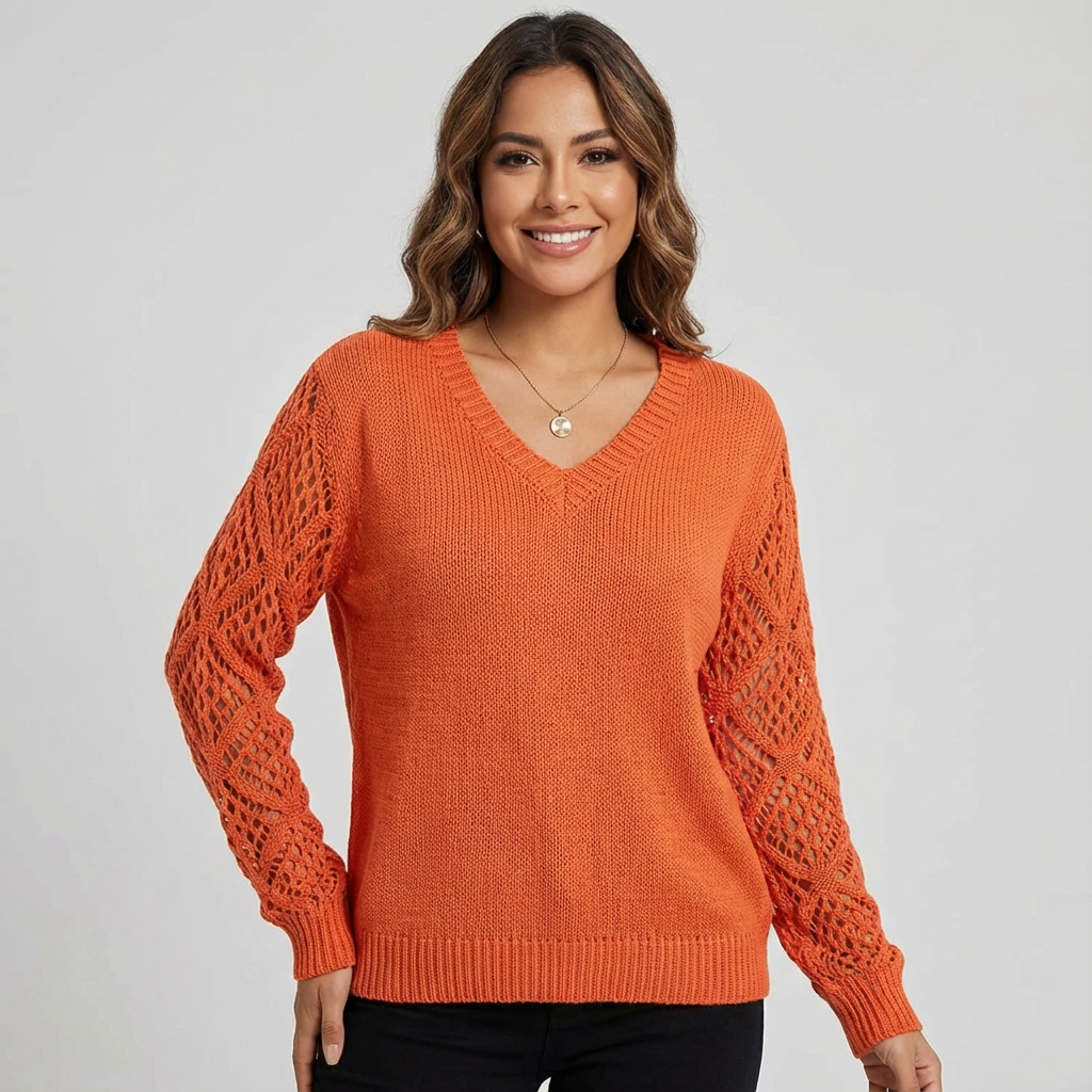 Fijngebreide v-hals damestrui met opengewerkte mouwen
