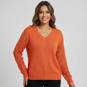 Fijngebreide v-hals damestrui met opengewerkte mouwen