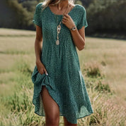 Fleurige zomerjurk met speelse print - Sanne