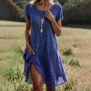 Fleurige zomerjurk met speelse print - Sanne