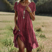 Fleurige zomerjurk met speelse print - Sanne