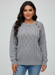 Gebreide dames sweater met sierknopen en kabelstructuur