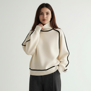 Gebreide damestrui met hoge kraag en contrasterende lijnen