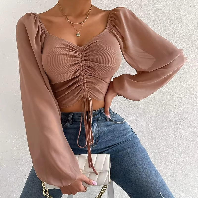 Gerimpte crop blouse met sheer mouwen – Aura