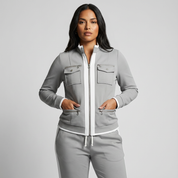 Getailleerde dames set met ritsjack en broek met contrastdetails