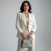 Getailleerde double-breasted damesblazer met goudkleurige knopen