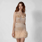 Glamoureuze pailletten veren cocktailjurk