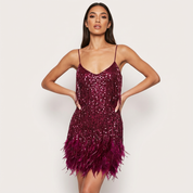 Glamoureuze pailletten veren cocktailjurk