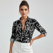 Grafische blouse met omlegkraag