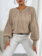 Kabelgebreide dames trui met volume mouwen – Merel