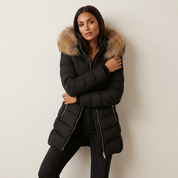 Lange gewatteerde dames winterjas met faux fur capuchon – Anne