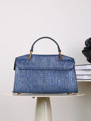 stijlvolle tas met opvallend patroon en elegante uitstraling