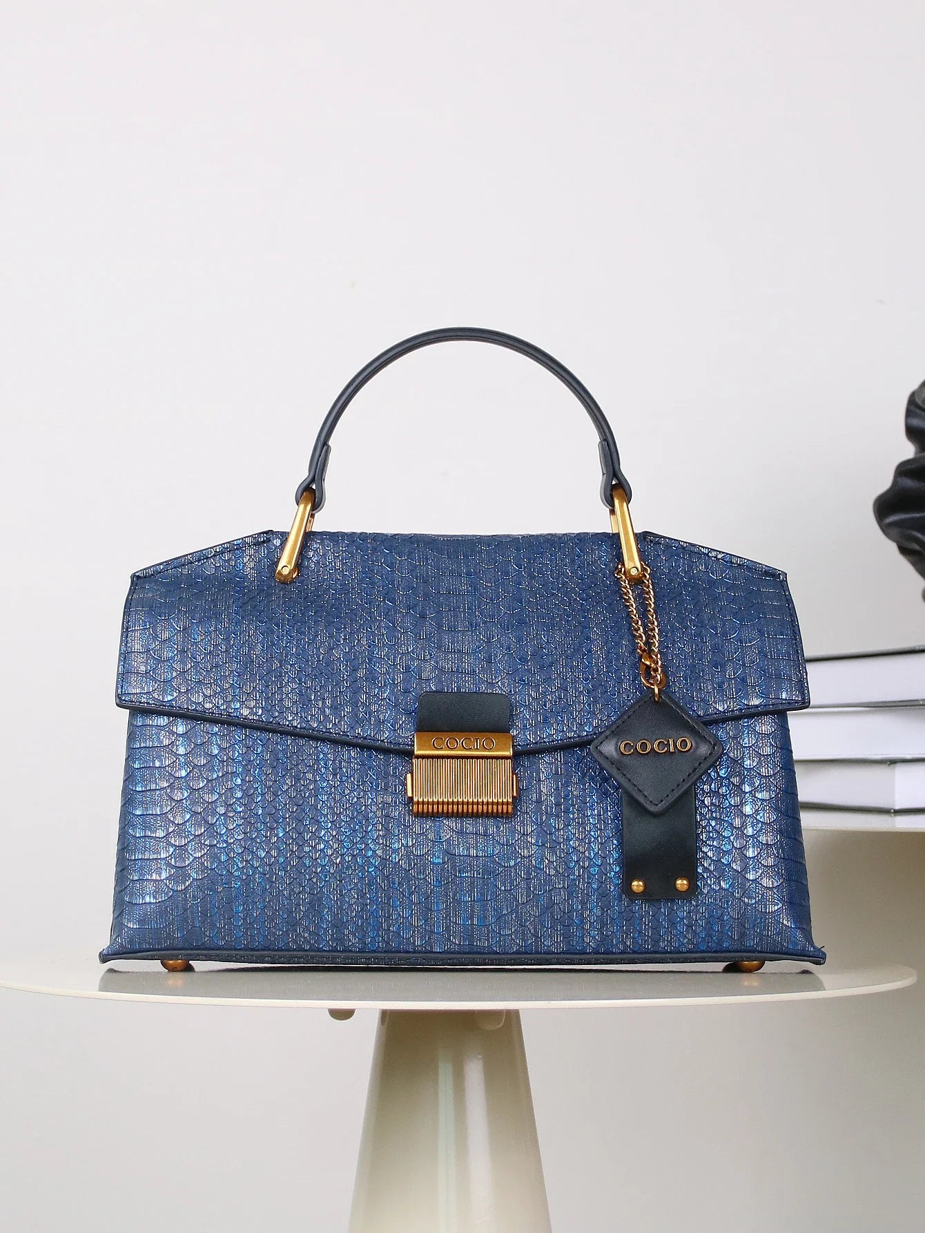 stijlvolle tas met opvallend patroon en elegante uitstraling