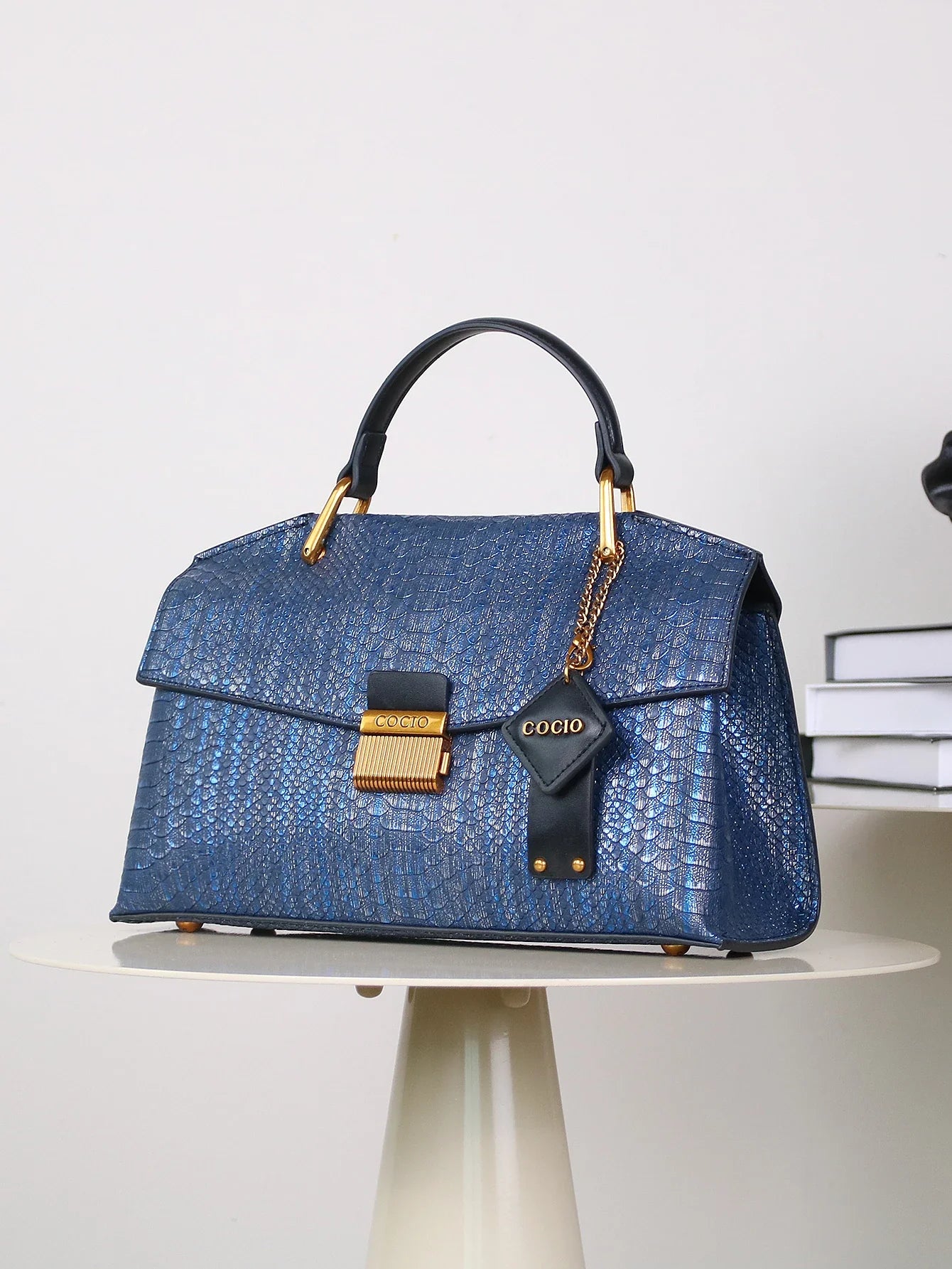 stijlvolle tas met opvallend patroon en elegante uitstraling