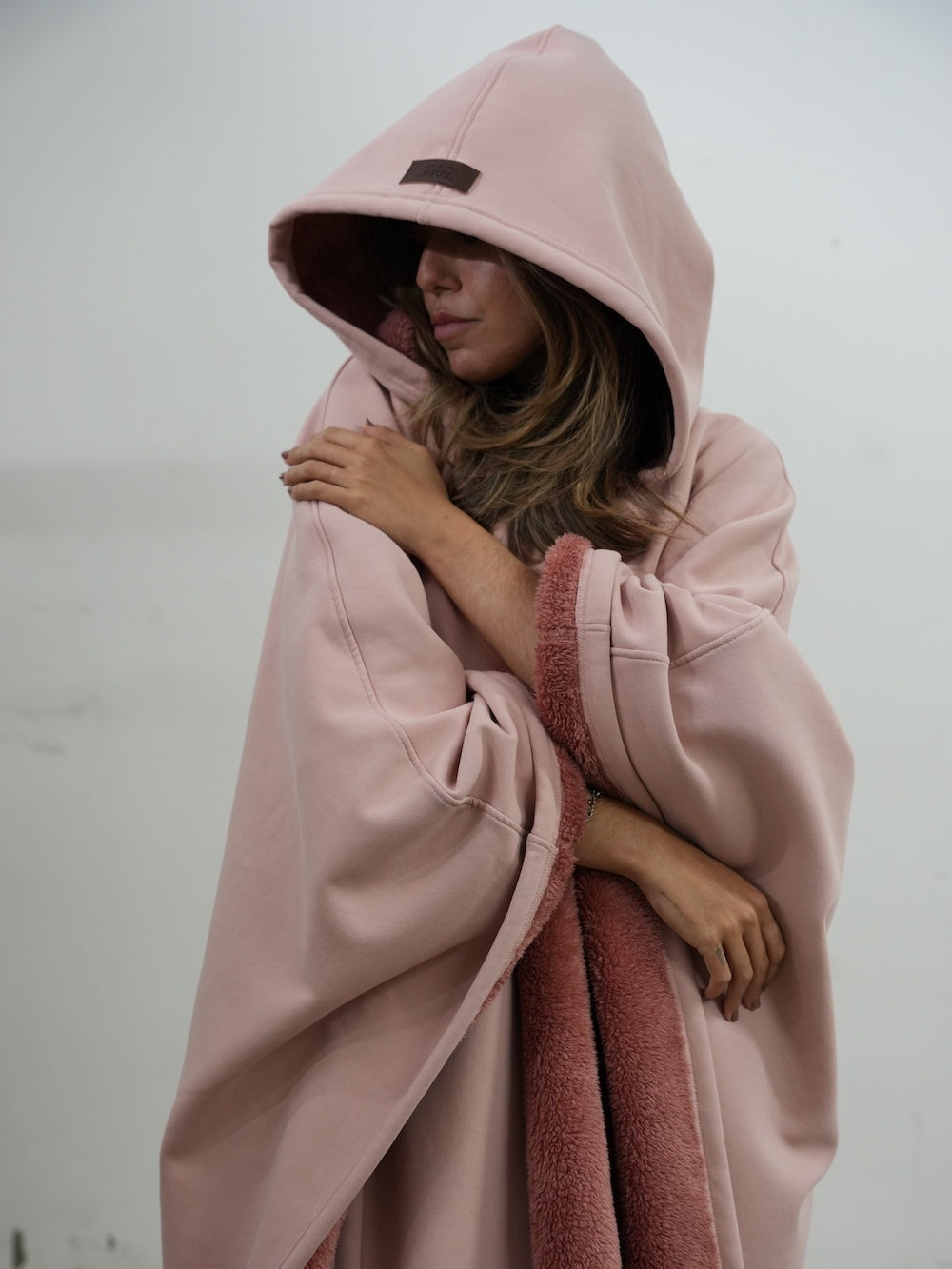 Luxe fleece poncho met capuchon