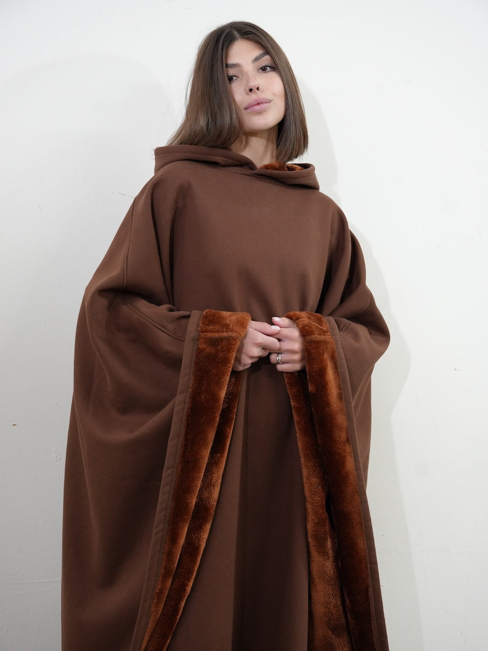 Luxe fleece poncho met capuchon