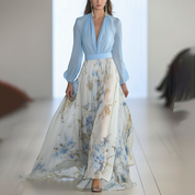 elegante en luchtige jurk met opvallende bloemenprint voor een vrouwelijke en stijlvolle look.