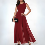 Mouwloze elegante jumpsuit met wijde pijpen en flowy overlay