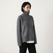 Oversized coltrui met hoge hals