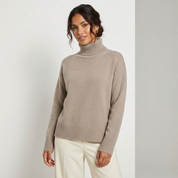 Oversized coltrui met hoge hals