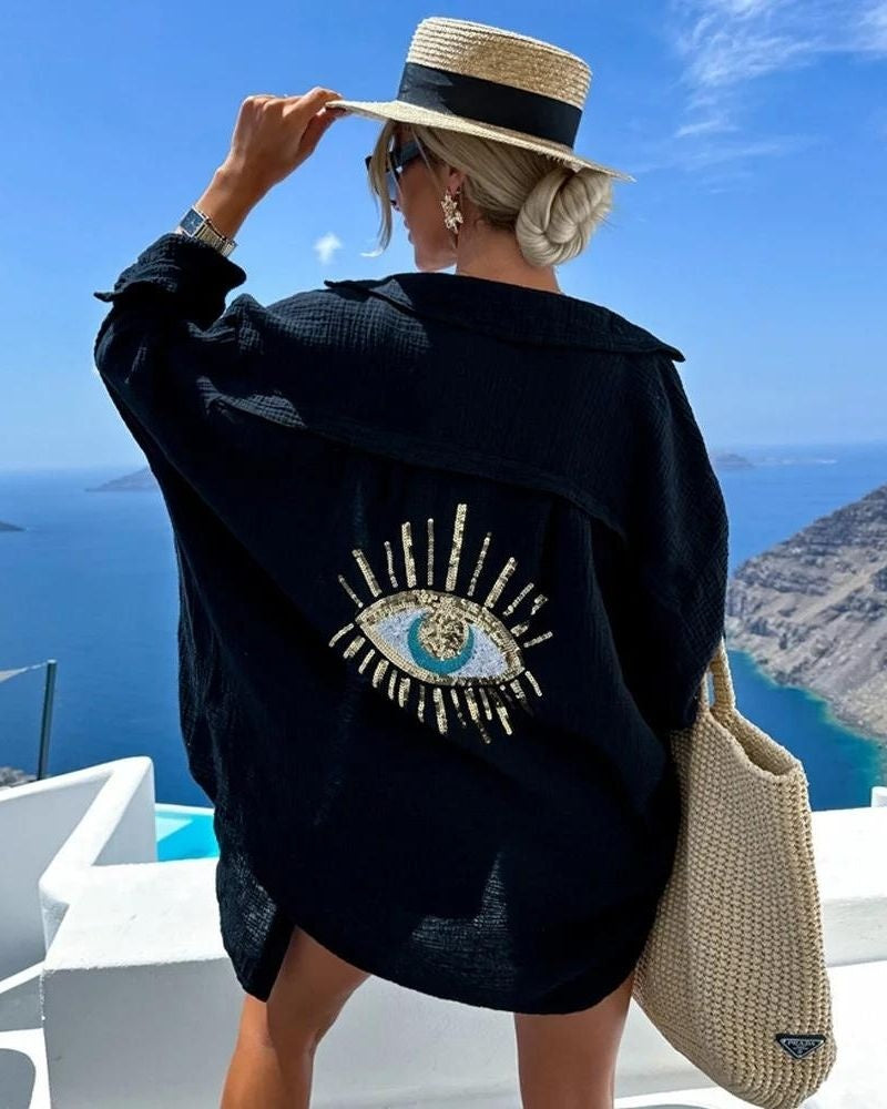 Oversized dames blouse met geborduurd oogdetail – Isadora