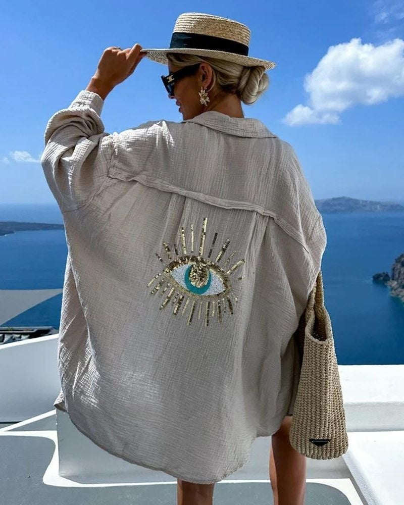 Oversized dames blouse met geborduurd oogdetail – Isadora