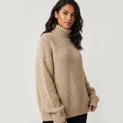 Oversized grofgebreide trui met col en ballonmouwen