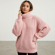 Oversized grofgebreide trui met col en ballonmouwen