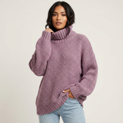 Oversized grofgebreide trui met col en ballonmouwen