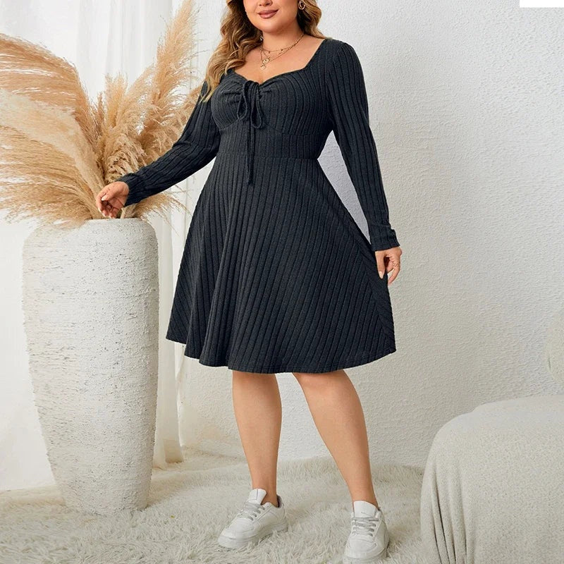 Ribgebreide midi jurk met strikdetail – Avani